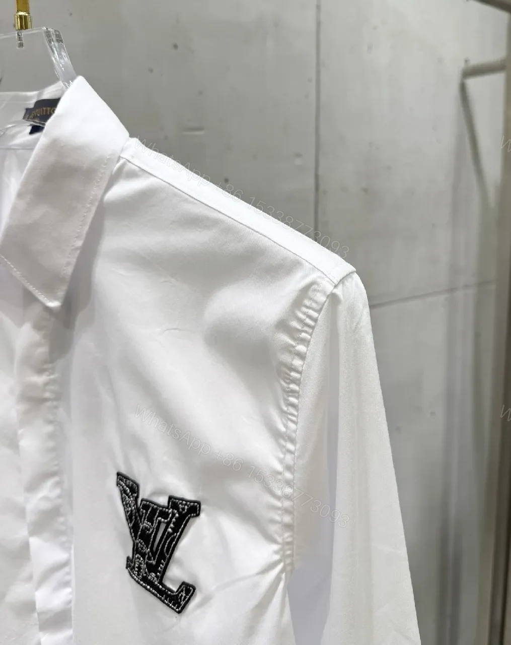 View 2 of White Button-Down Shirt: Subtle LV Crest, Clean Luxury, All-Day Comfort