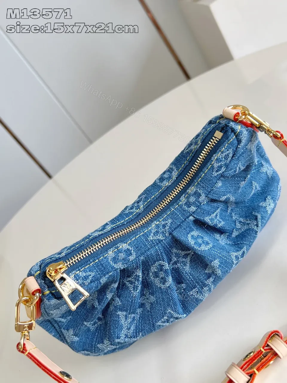 View 4 of Denim Monogram Crescent Bag: Modern, Durable, Luxury Accessory