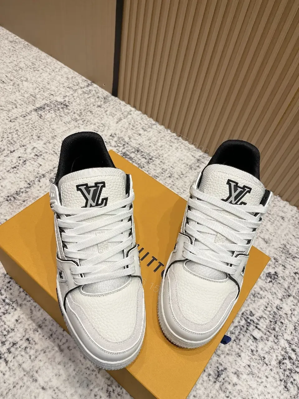 View 9 of White Leather Runner Sneakers with LV Detailing