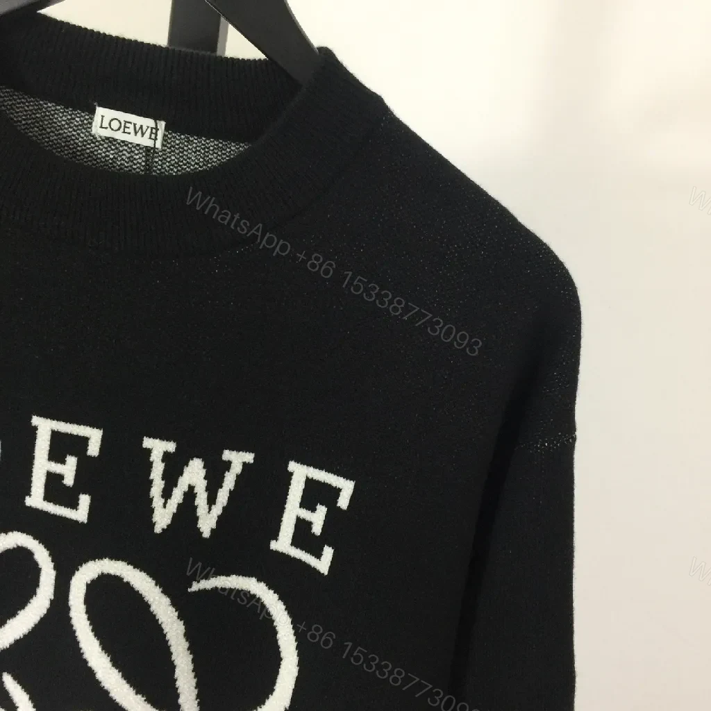 View 5 of Bold Logo Knit with Iconic Graphic Detailing — Modern Sophistication Knit