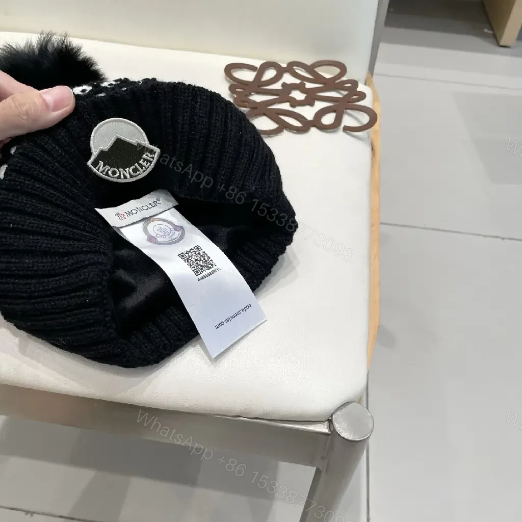 View 3 of Chic Knit Beanie: Textured Warmth with Pom Pom