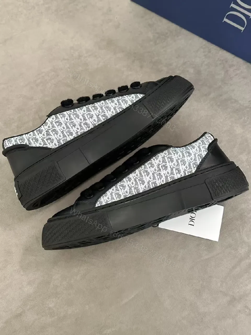 View 5 of Bold Leather High-Top Sneakers with Red Script Graphic
