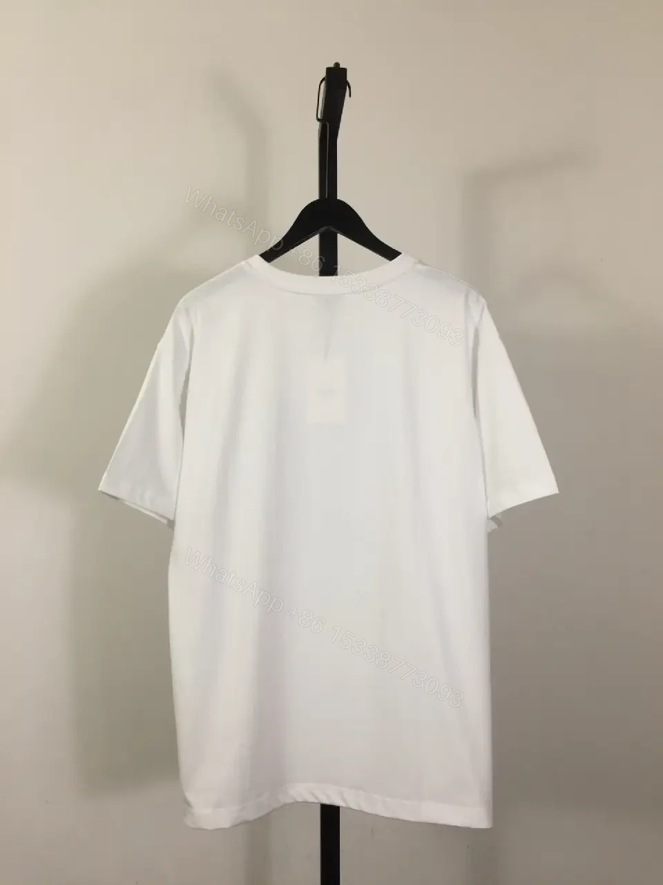 View 7 of White Cotton Tee — Modern Casual Comfort with Subtle Luxury Dog