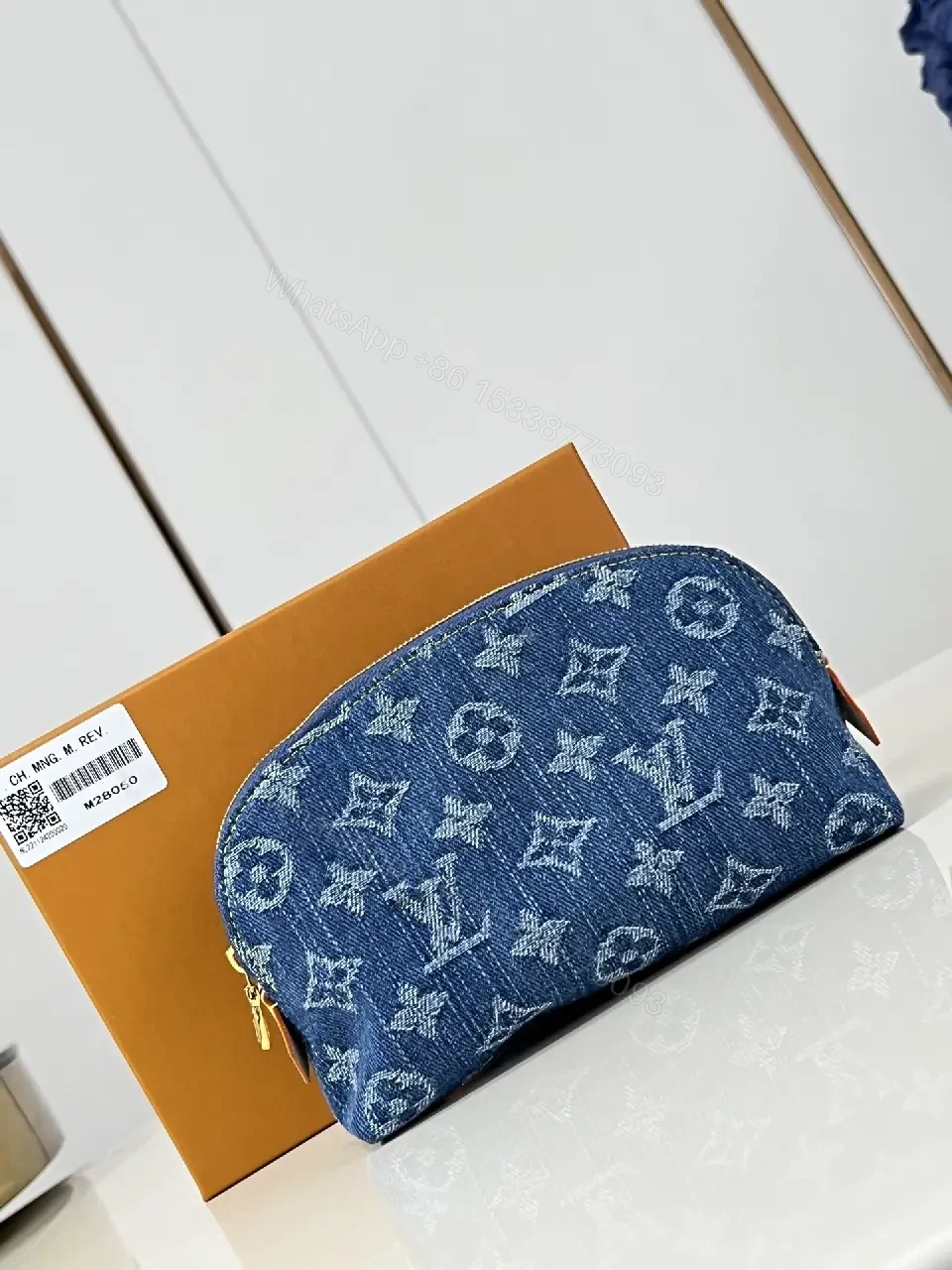 View 4 of Denim Monogram Pouch: Modern Texture, All-Day Luxury