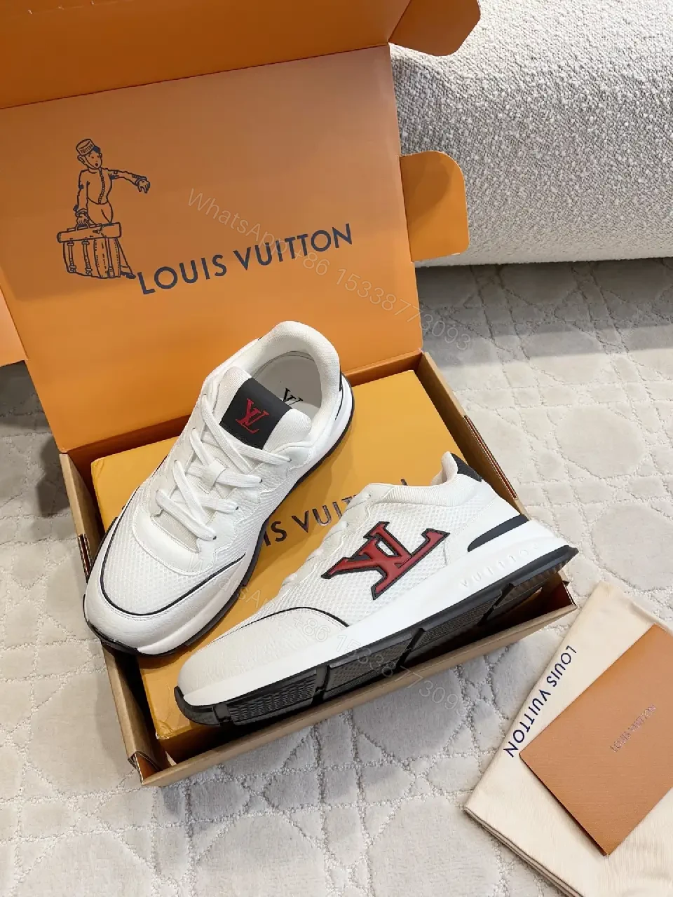 View 2 of White Leather Sneaker with Red LV Logo, Modern/Chunky Style, Comfort Feature, Louis Vuitton Sneaker
