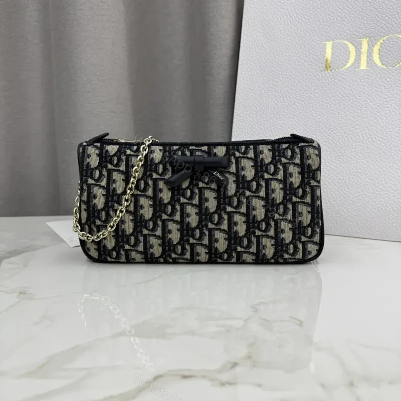 Monogram Clutch with Chain Handle — Modern Luxe Evening Bag — view 1