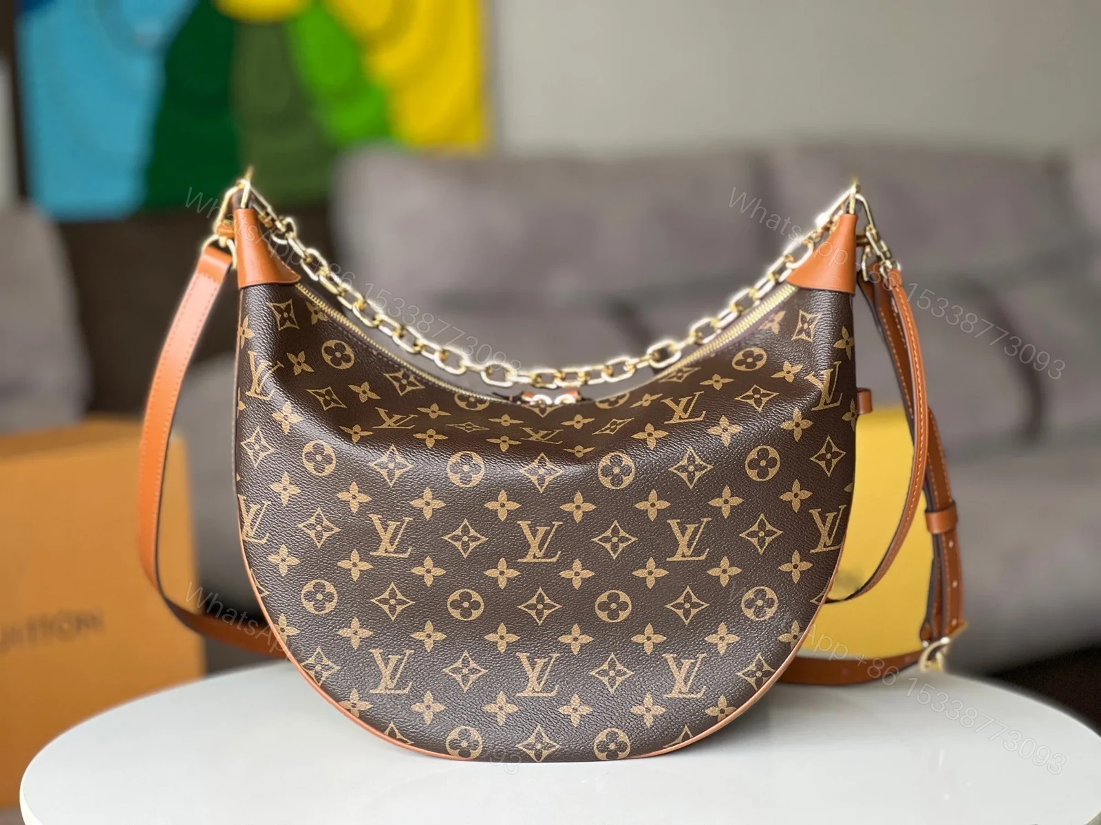 View 2 of LV 25S LOOP HOBO 38 IN BROWN MONOGRAM COATED CANVAS GOLD HARDWARE