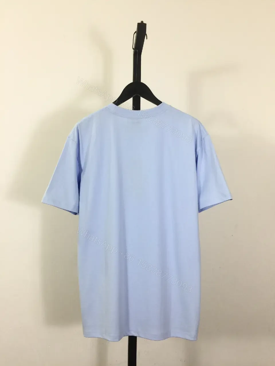 View 3 of Light Blue Oversized Tee with Sparkling DIOR Logo Embroidery, Short-Sleeve, Relaxed Fit
