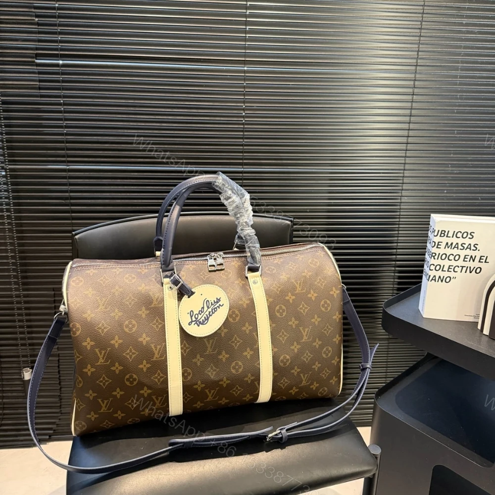 View 2 of Louis Vuitton Keepall Bandoulière 50 Monogram Canvas Light Yellow 45cm