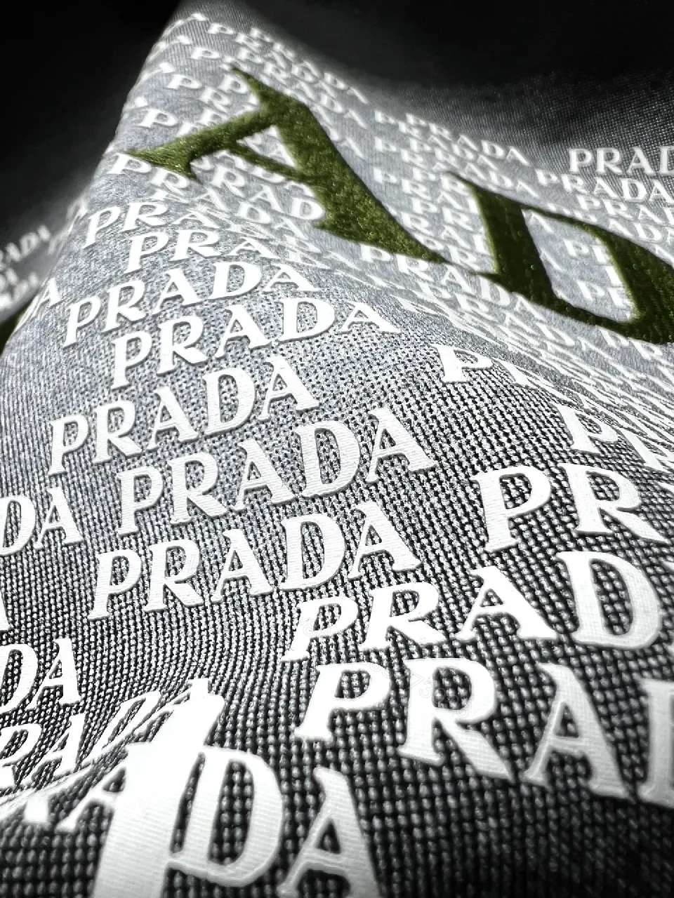 View 10 of Black Graphic Tee: Premium Prada Triangle Logo, Modern Streetwear