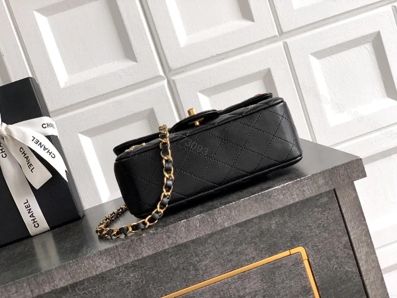 View 10 of Quilted Black Leather Crossbody: Golden Turn-Lock Charm Bag