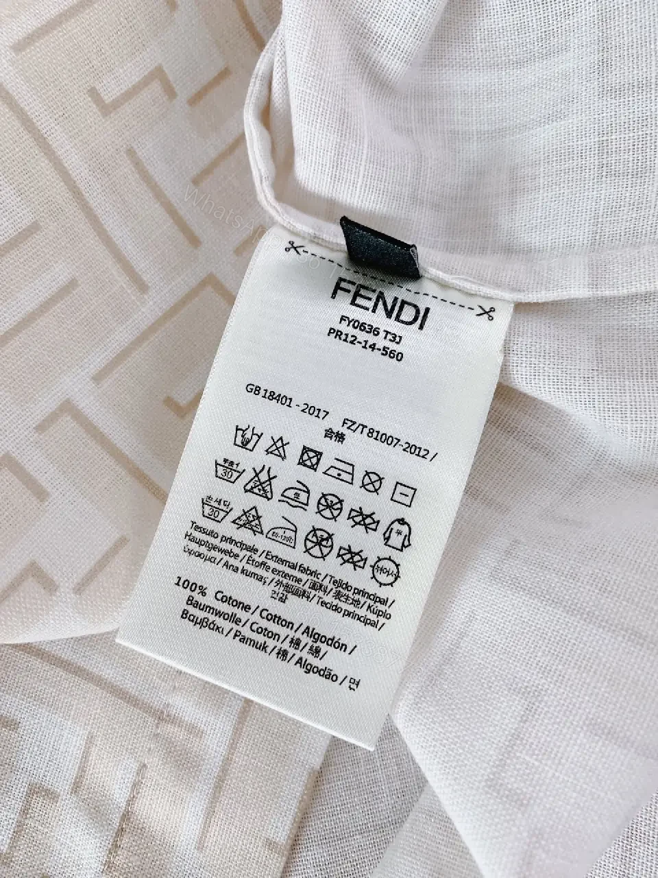 View 4 of Off-White Beige Embossed Geometric Polo Shirt - Short Sleeve, Relaxed Fit