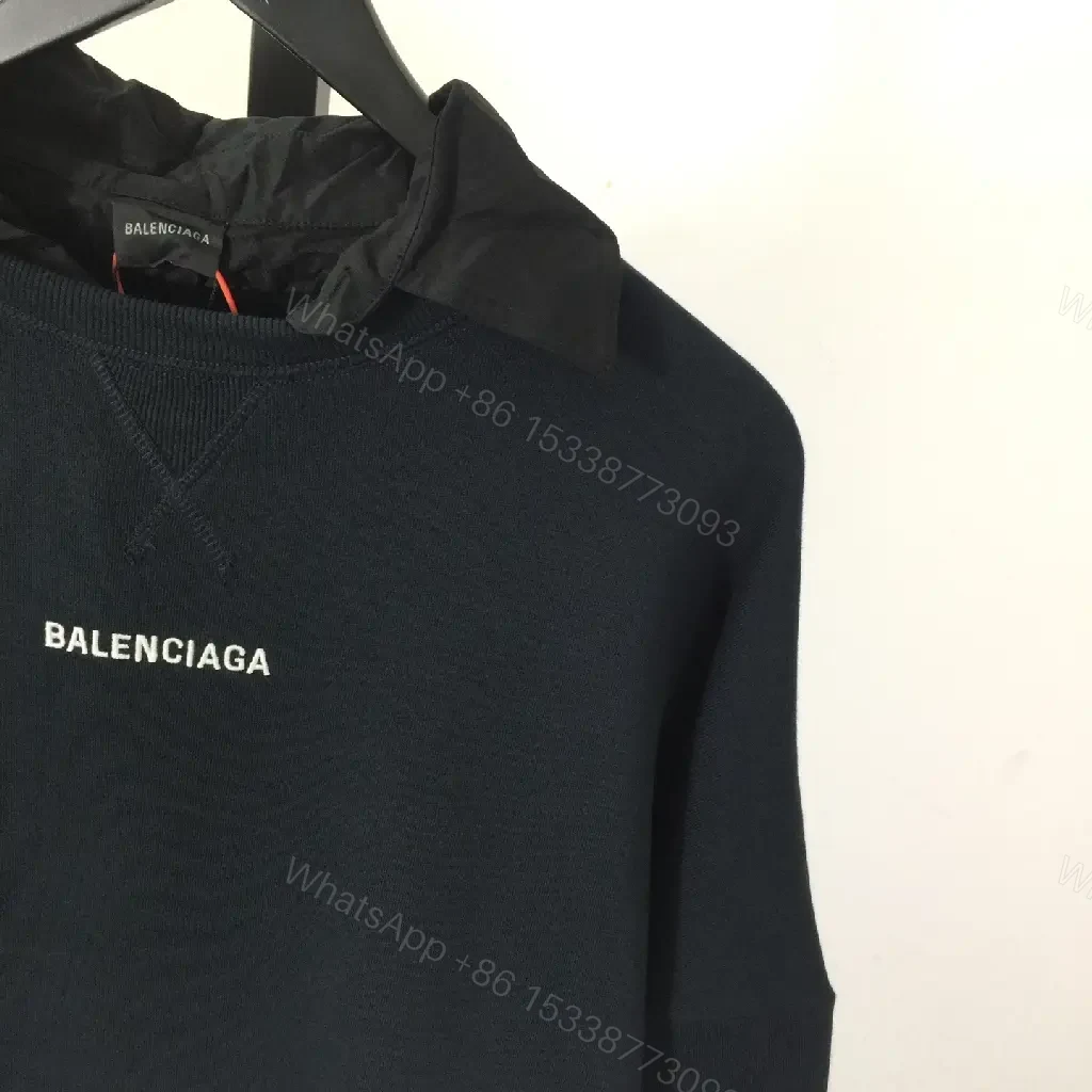 View 6 of Deep Black Hoodie: Minimalist Logo, Premium Knitwear, Relaxed Fit