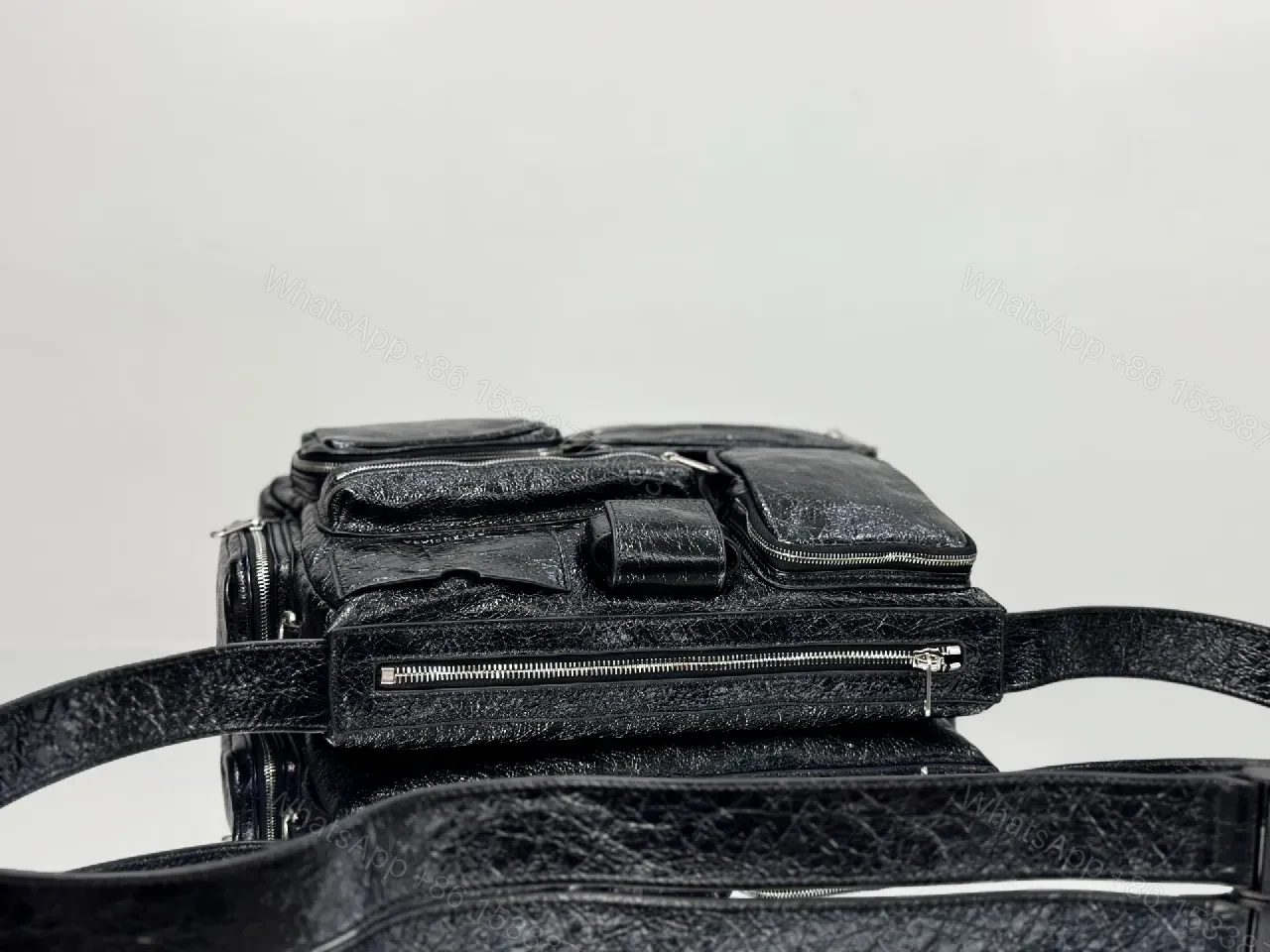 View 5 of Compact Black Leather Messenger Bag: Sleek Crossbody Utility