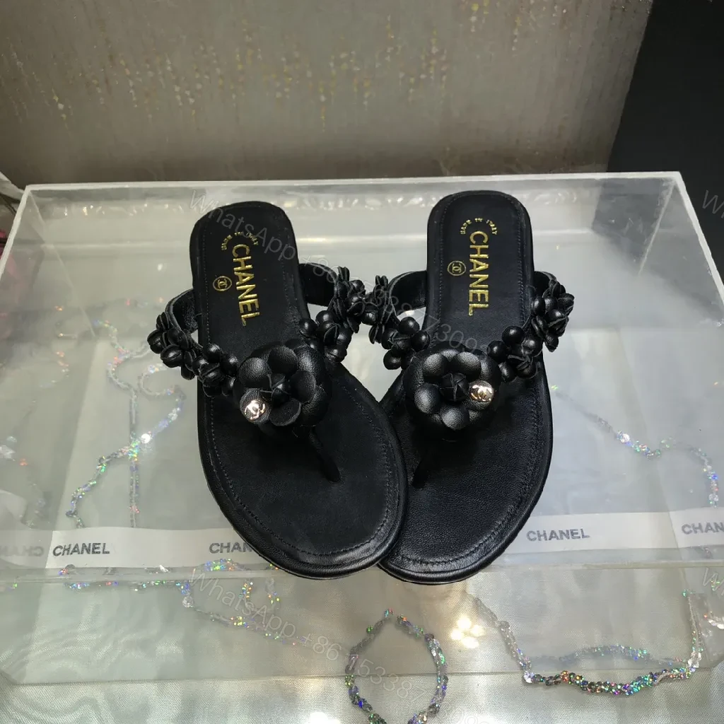 View 4 of Black Leather-Feel Floral Slip-Ons with Luxe Accents
