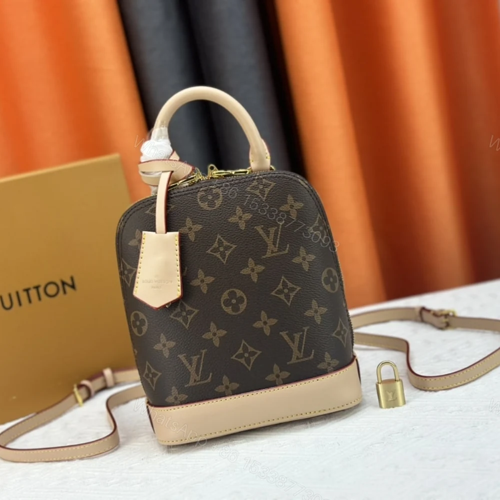 View 2 of Louis Vuitton Alma Backpack Monogram Canvas Brown 20Cm M47132