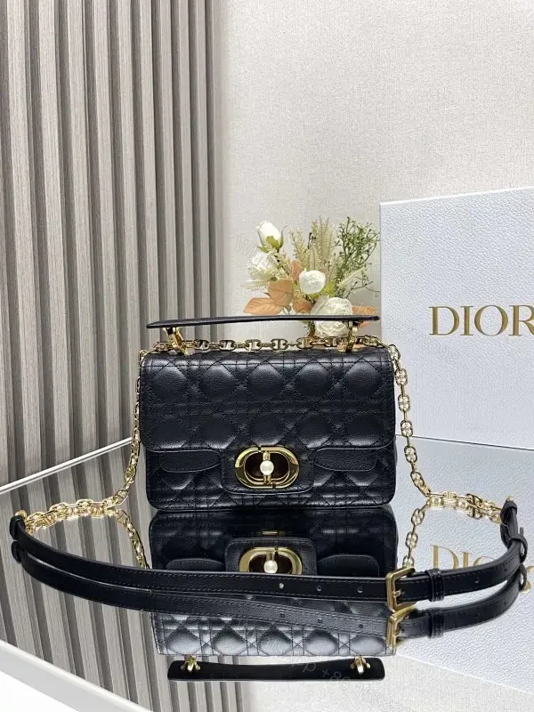 Quilted Black Crossbody with Gold Chain: Modern Luxury Bag — view 1