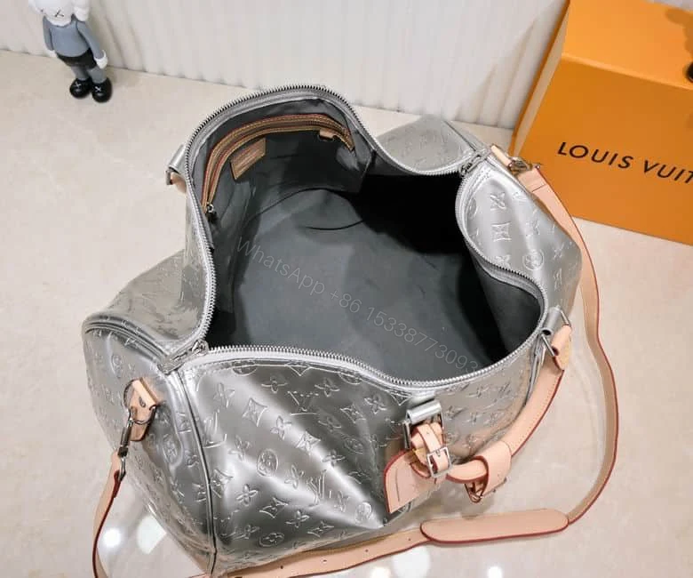View 8 of LOUIS VUITTON KEEPALL BANDOULIERE 50 SILVER