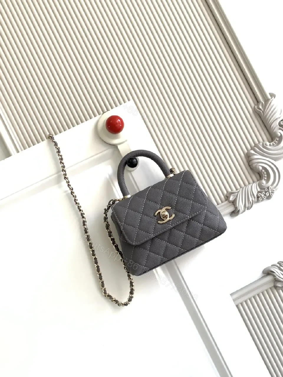 Charcoal Leather Quilted Mini Bag with Gold Chain Accent — view 1