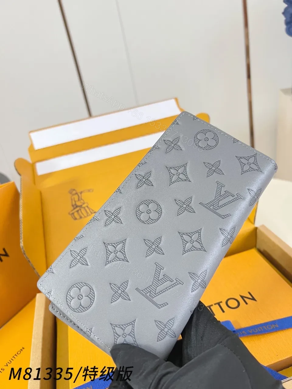 View 2 of Soft Gray Monogram Leather Wallet: Compact Luxury, Signature Detail