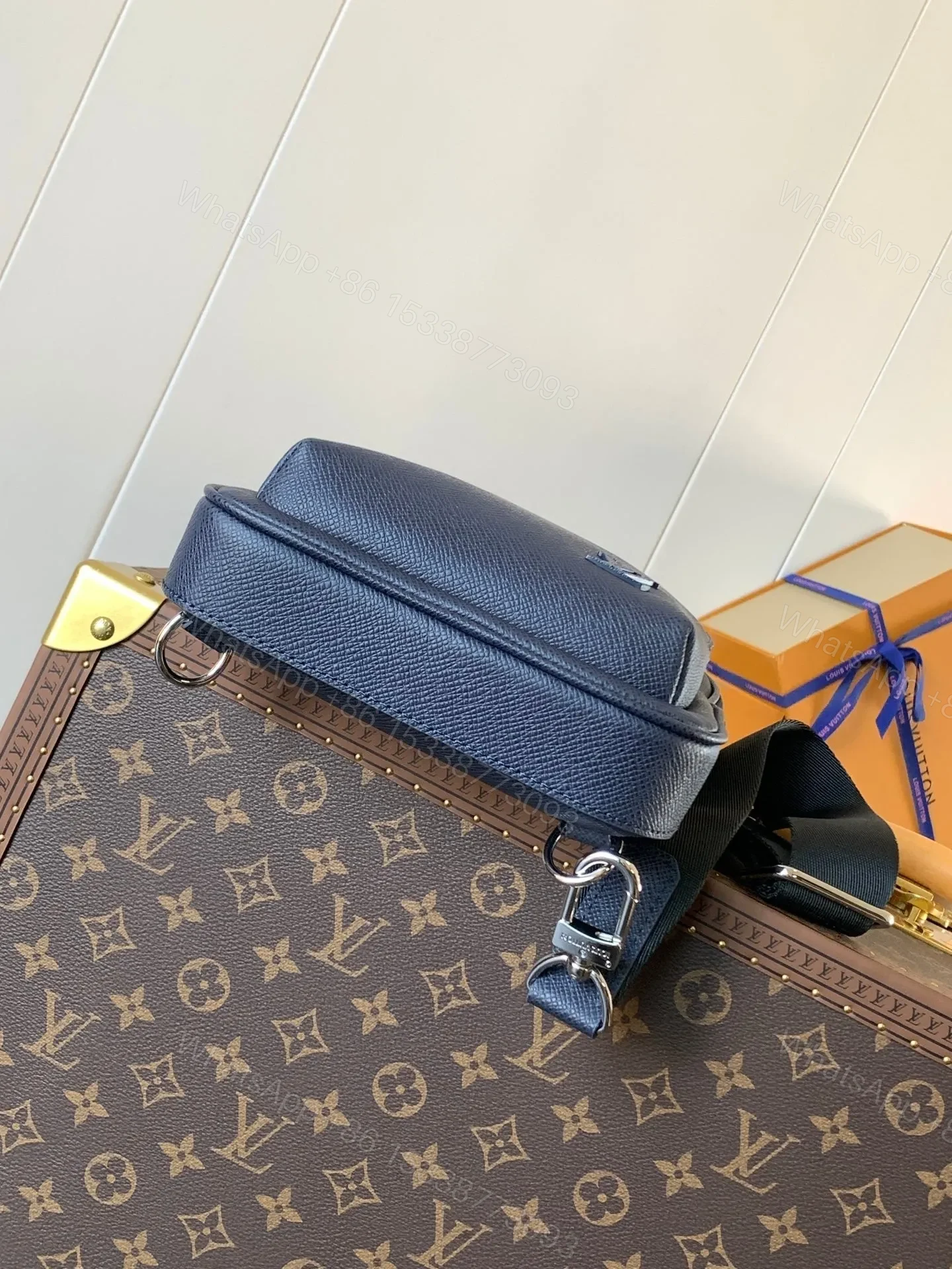 View 6 of LV AVENUE SLINGBAG 31 IN NAVY BLUE TAIGA LEATHER