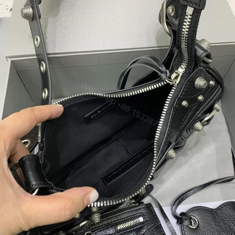 View 8 of Sculpted Black Leather Messenger Bag with Brass Accents