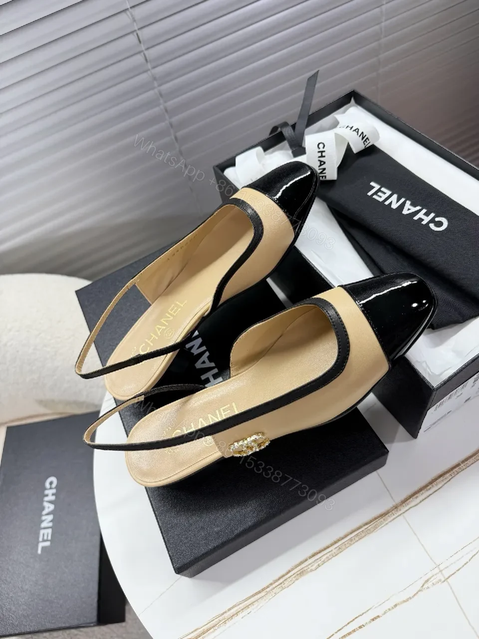 View 3 of Beige Leather Slingback Pumps with Glossy Cap Toe
