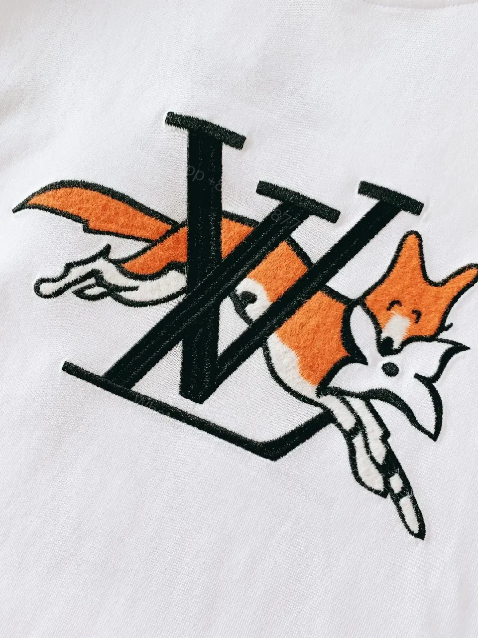 View 9 of Bold Cotton Tee + Graphic Logo + Casual Luxe + High-Contrast Graphic + T-Shirt