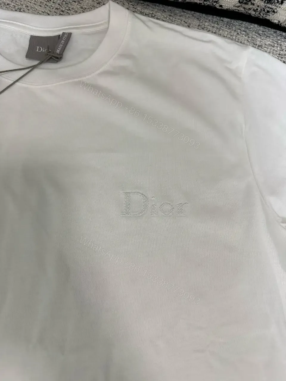 View 10 of Minimalist White Cotton Tee with Subtle Logo
