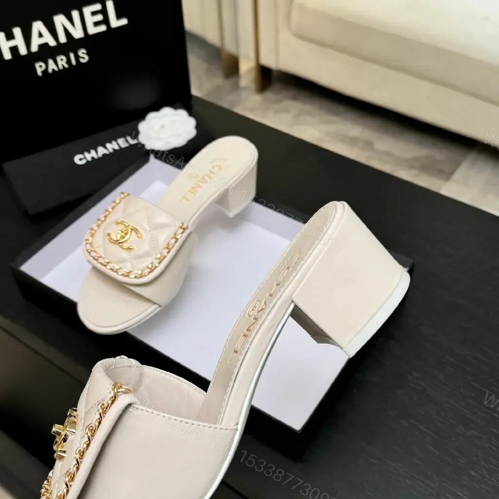 View 2 of Chic Quilted Leather Slides with Gold Logo - Light Beige
