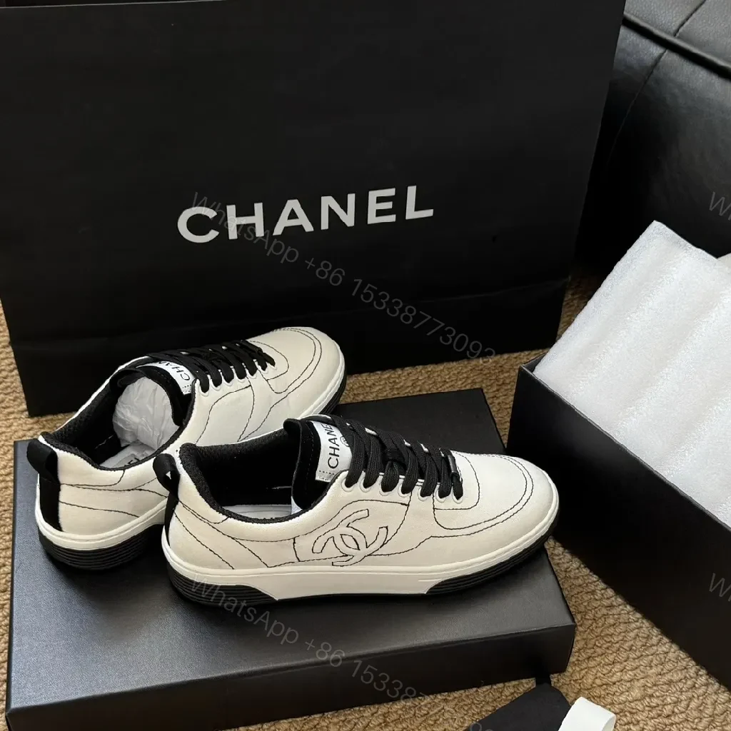 View 2 of Chic Leather High-Top Sneaker with Couture Detailing
