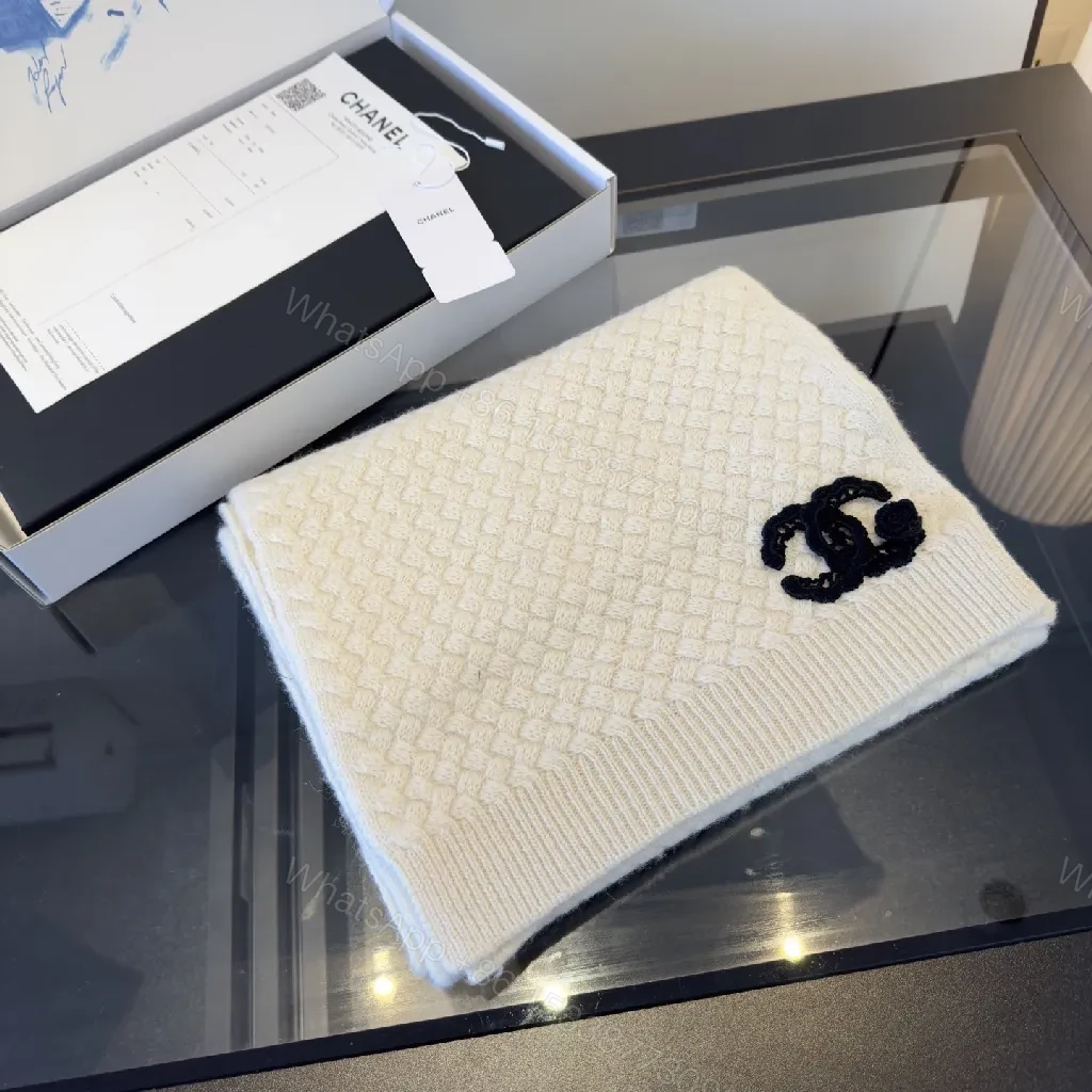 View 7 of Ivory Knit Set: Textured Luxury with Iconic Emblem