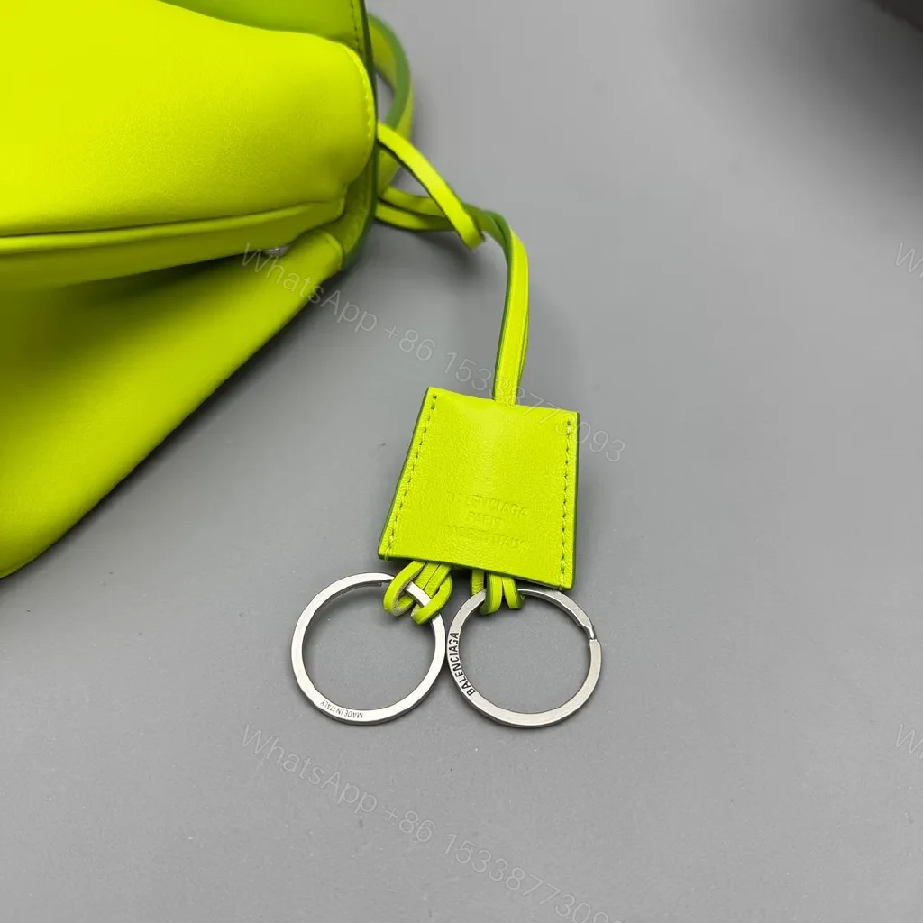 View 4 of Neon Lime Leather Mini Bag – Luxe, Versatile, Compact