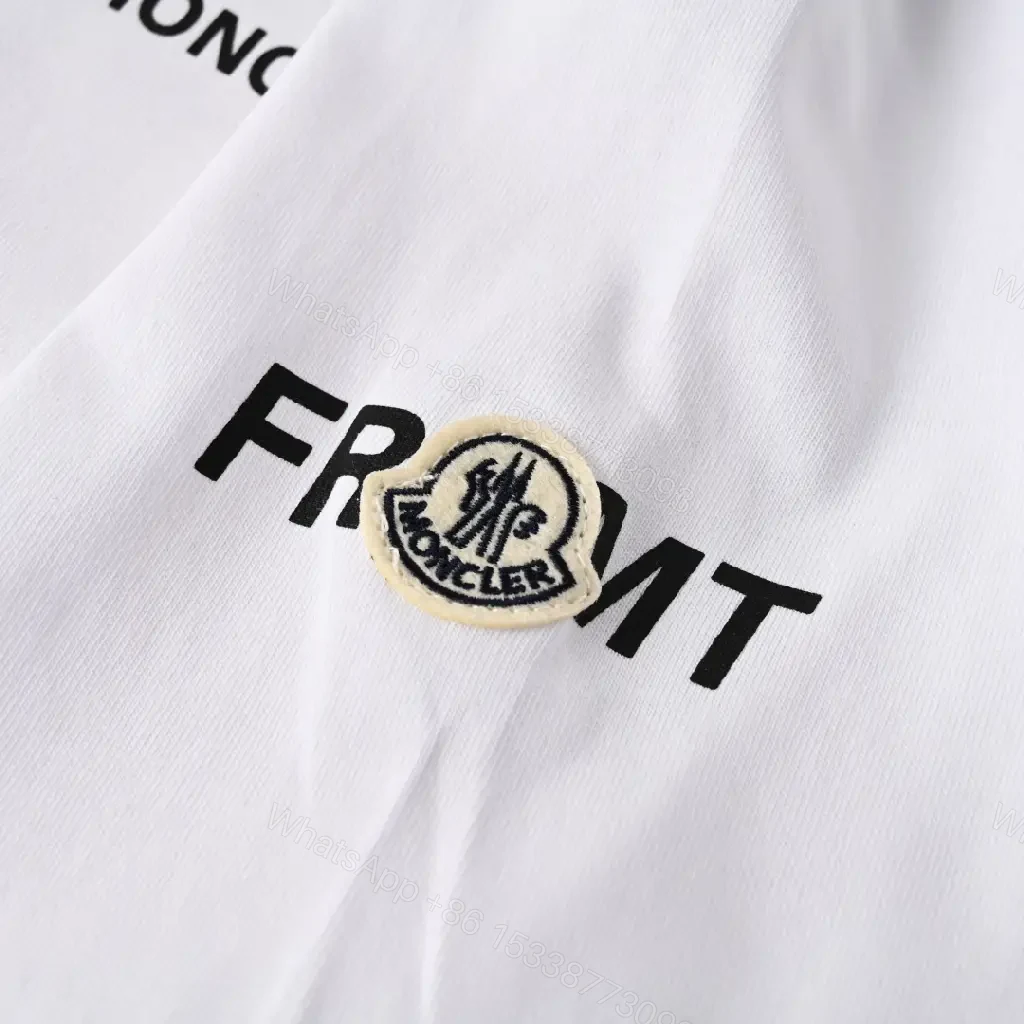 View 7 of Lightweight White Tee with Subtle Moncler Logo, Modern, Ultra-Comfortable