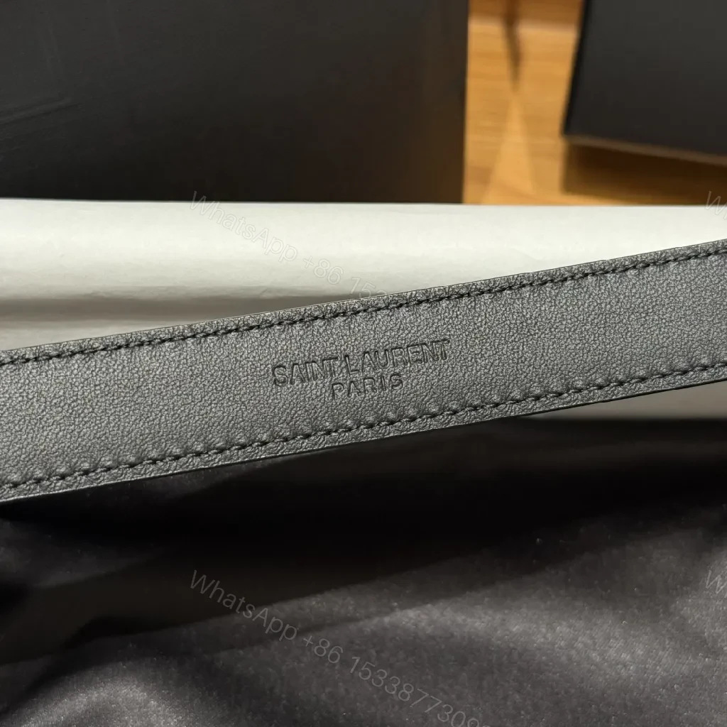 View 2 of Elegant Black Leather Belt with Gold Hardware Belts: Luxury, Subtle Logo