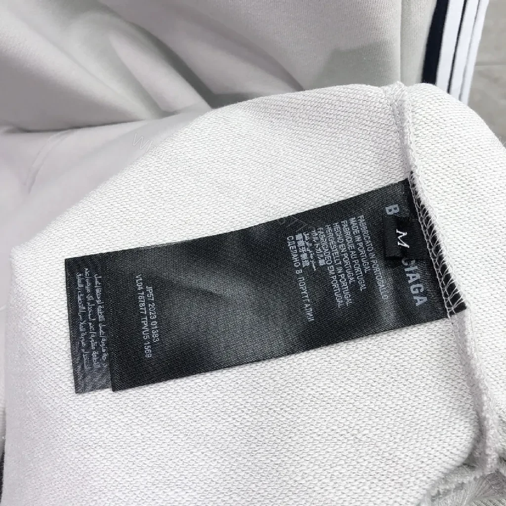View 9 of Minimalist Sporty Hoodie with Striped Details in Knit Comfort