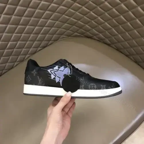 View 2 of LOUIS VUITTON RIVOLI SNAKERS IN BLACK CALF LEATHER AND MONOGRAM CANVAS – LSVT368