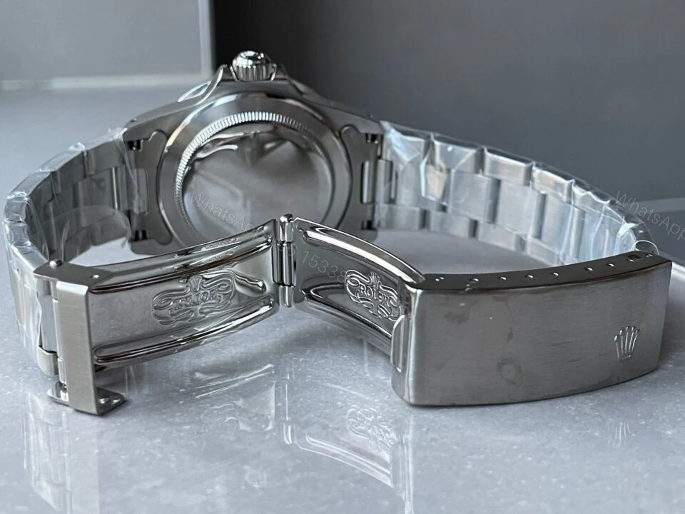 View 12 of VINTAGE Rolex Submariner Date Tiffany & Co 16610A30B9315 Black dial with SS bracelet