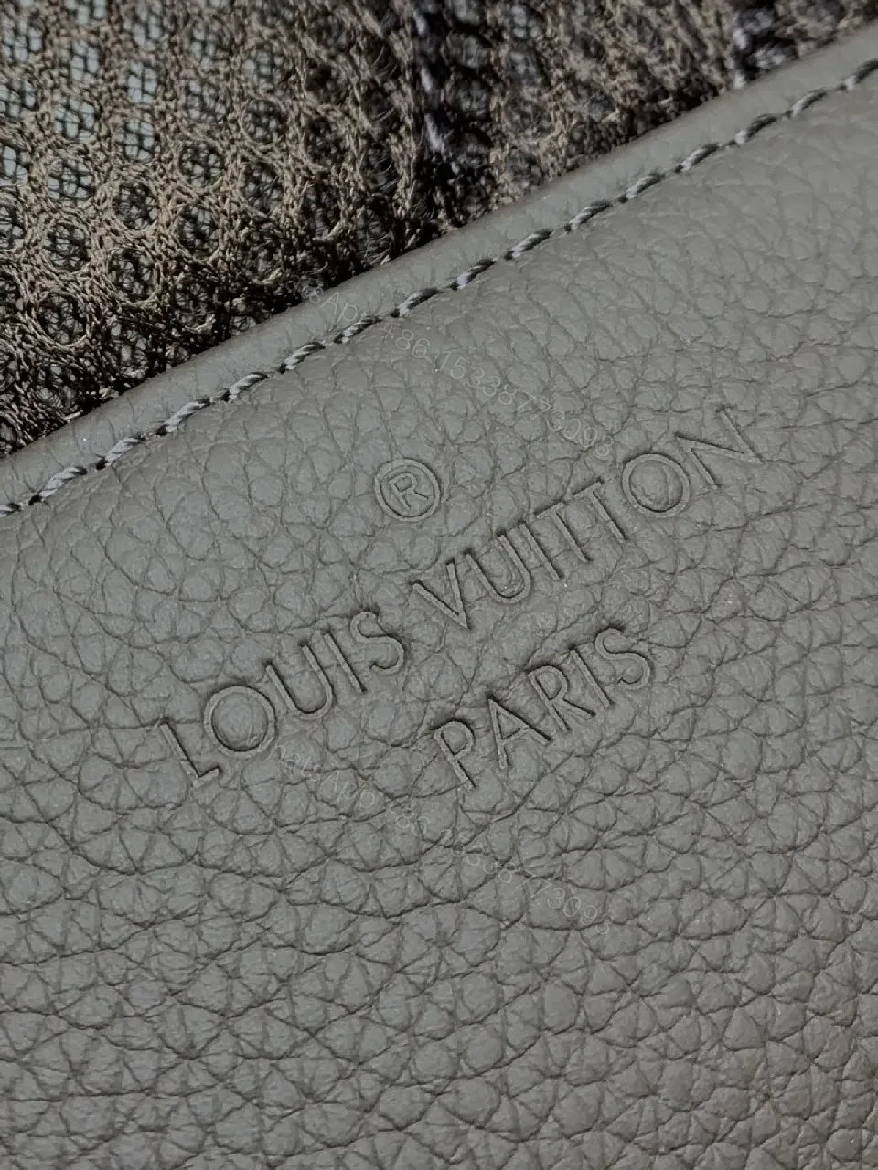 View 8 of Structured Minimalist Leather Backpack with Subtle LV Motif