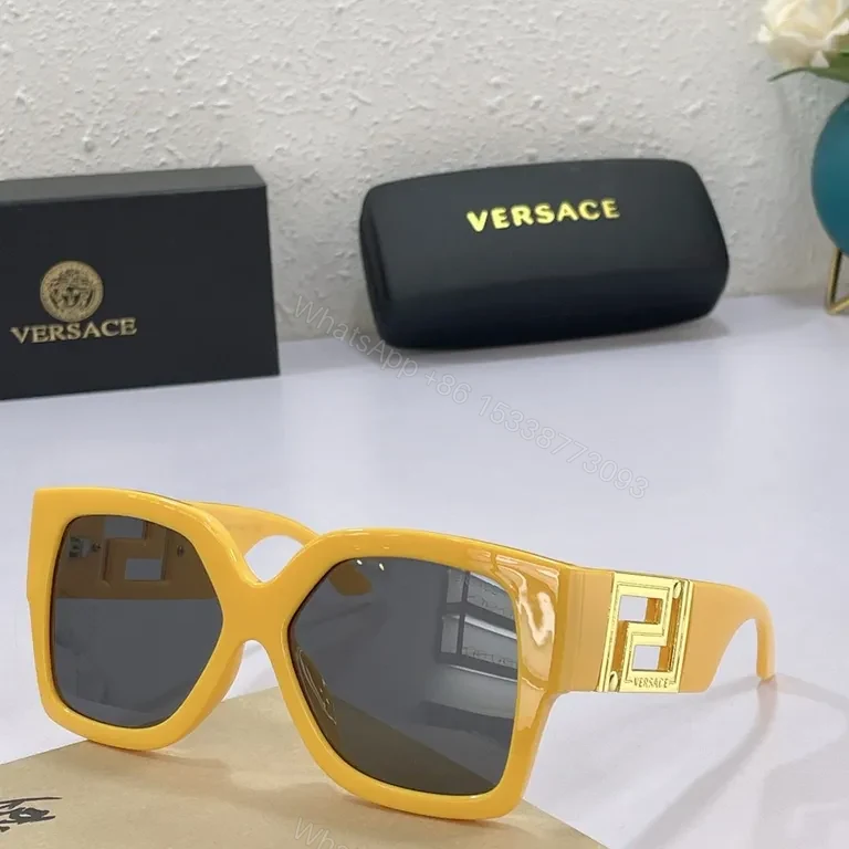 View 4 of Bold Black Acetate Sunglasses: Versace, Oversized Square with Gold Accents