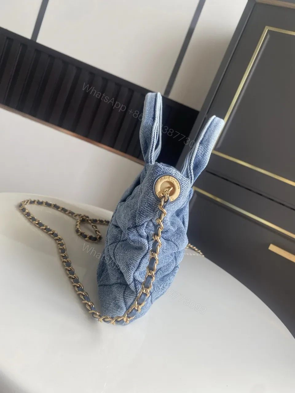 View 8 of Denim Quilted Mini Bag with Gold Hardware - Structured Chic