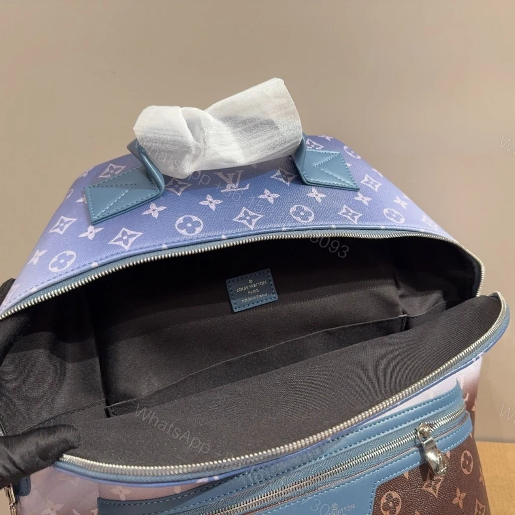 View 4 of Louis Vuitton Discovery Backpack PM Monogram Pigment Blue 38cm M28025
