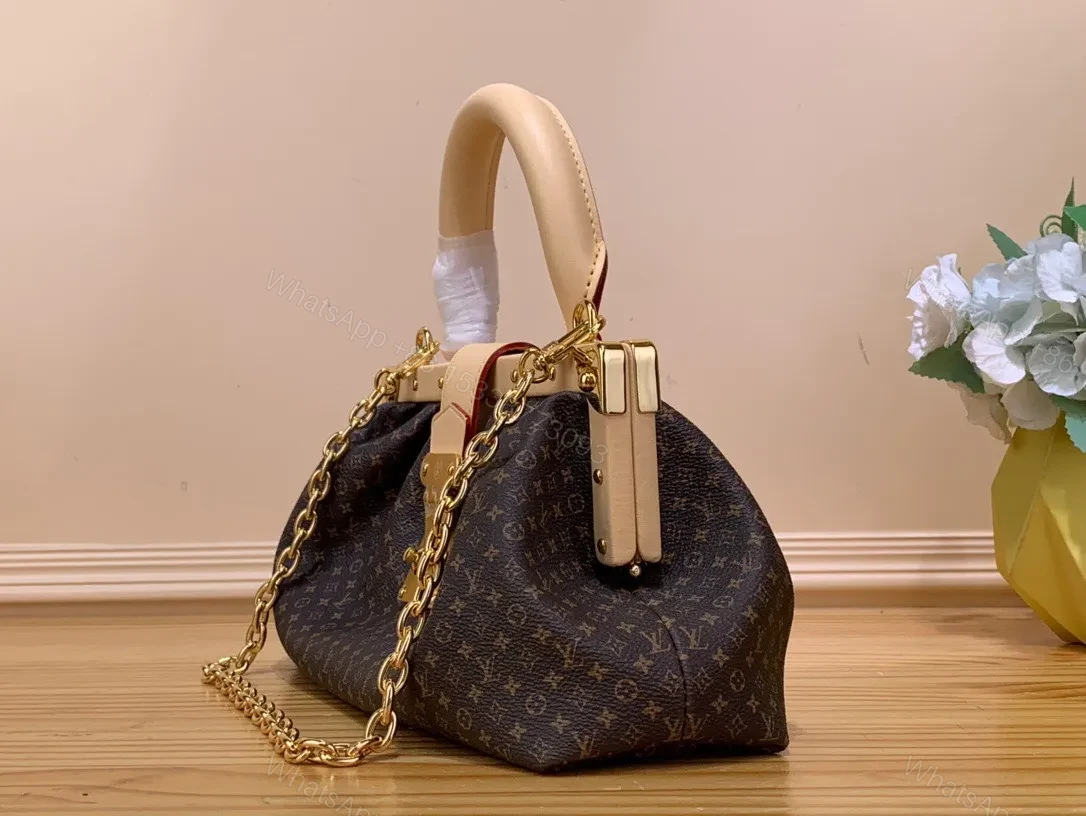 View 8 of Louis Vuitton LV Clucth Tisitt Like Auth Lock Handbags 28x14cm