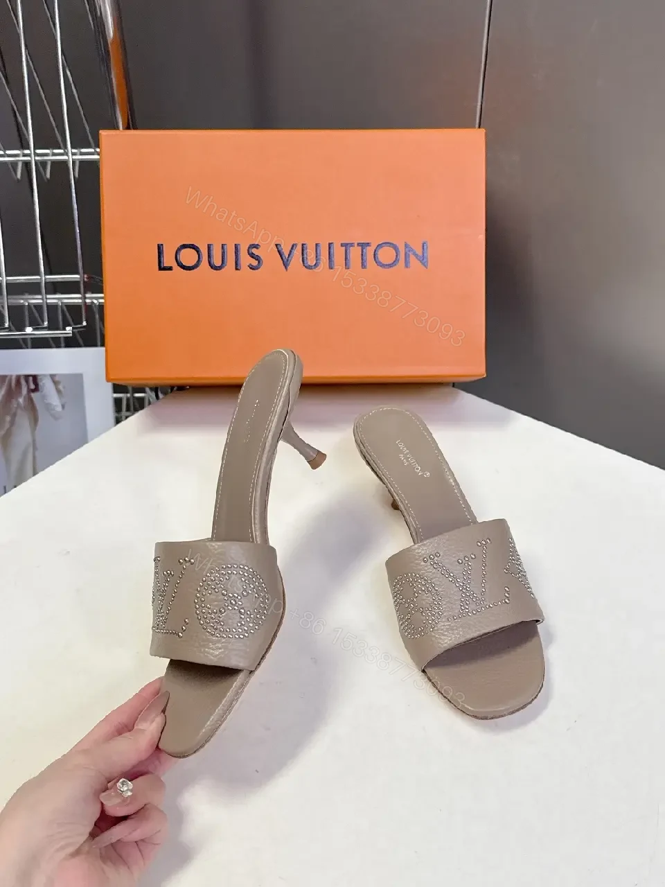 View 9 of Minimalist Taupe Leather Slides with Rhinestone Logo Embellishment