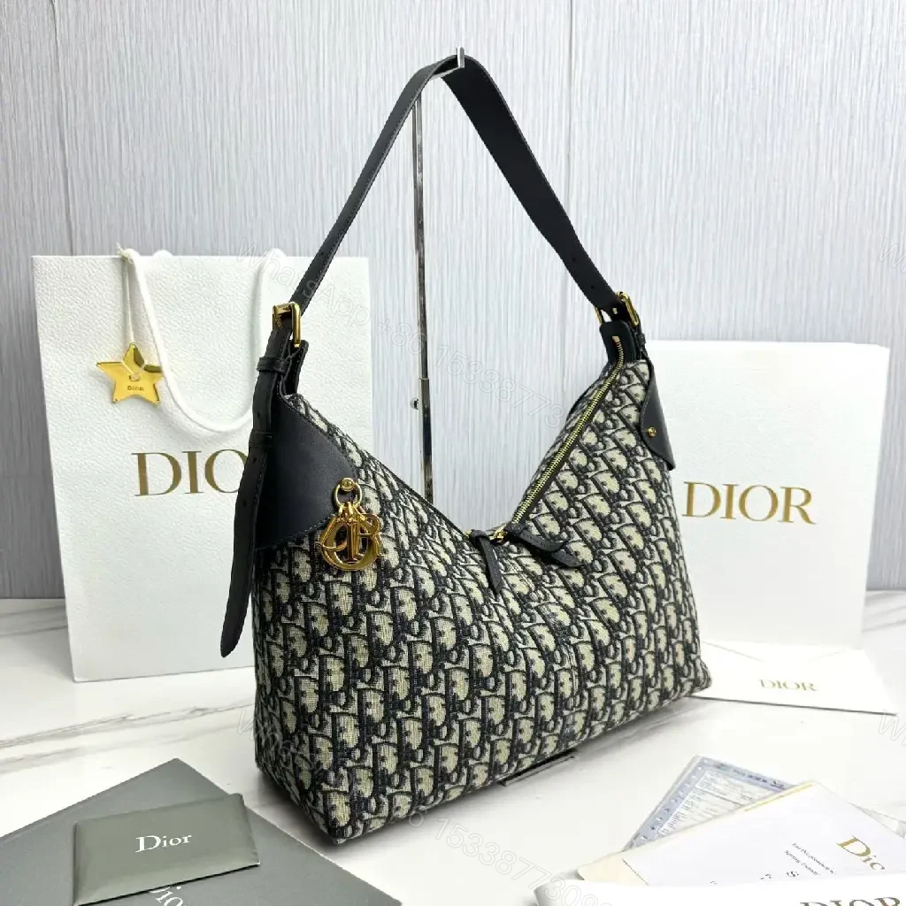 View 8 of Chic Monogram Shoulder Bag: Elegant & Versatile Satchel