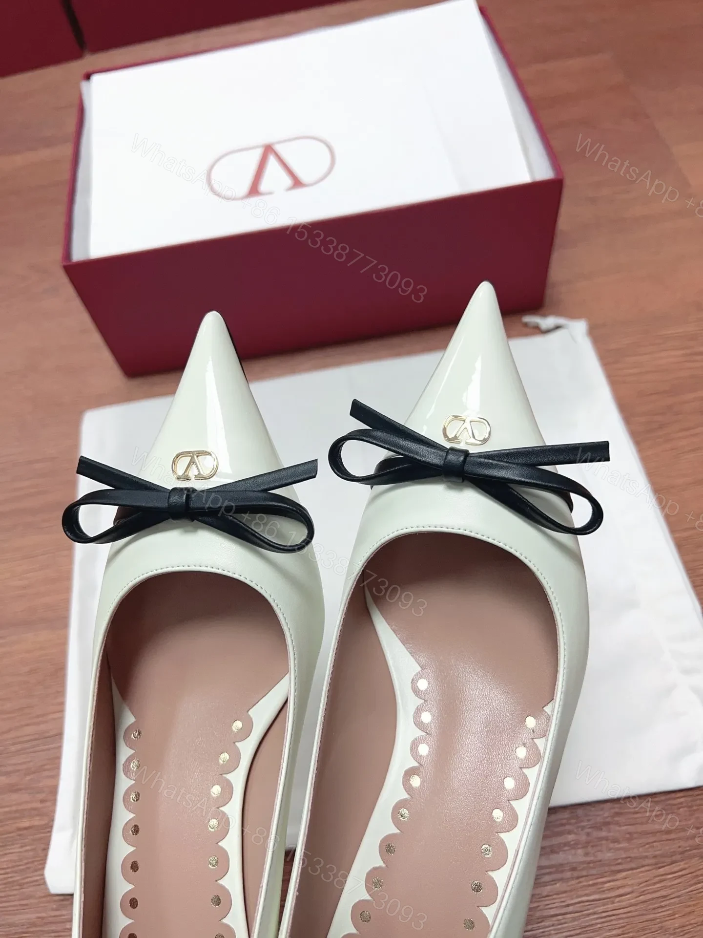 View 2 of Valentino Women Ivory Leather Bow Accent Pumps
