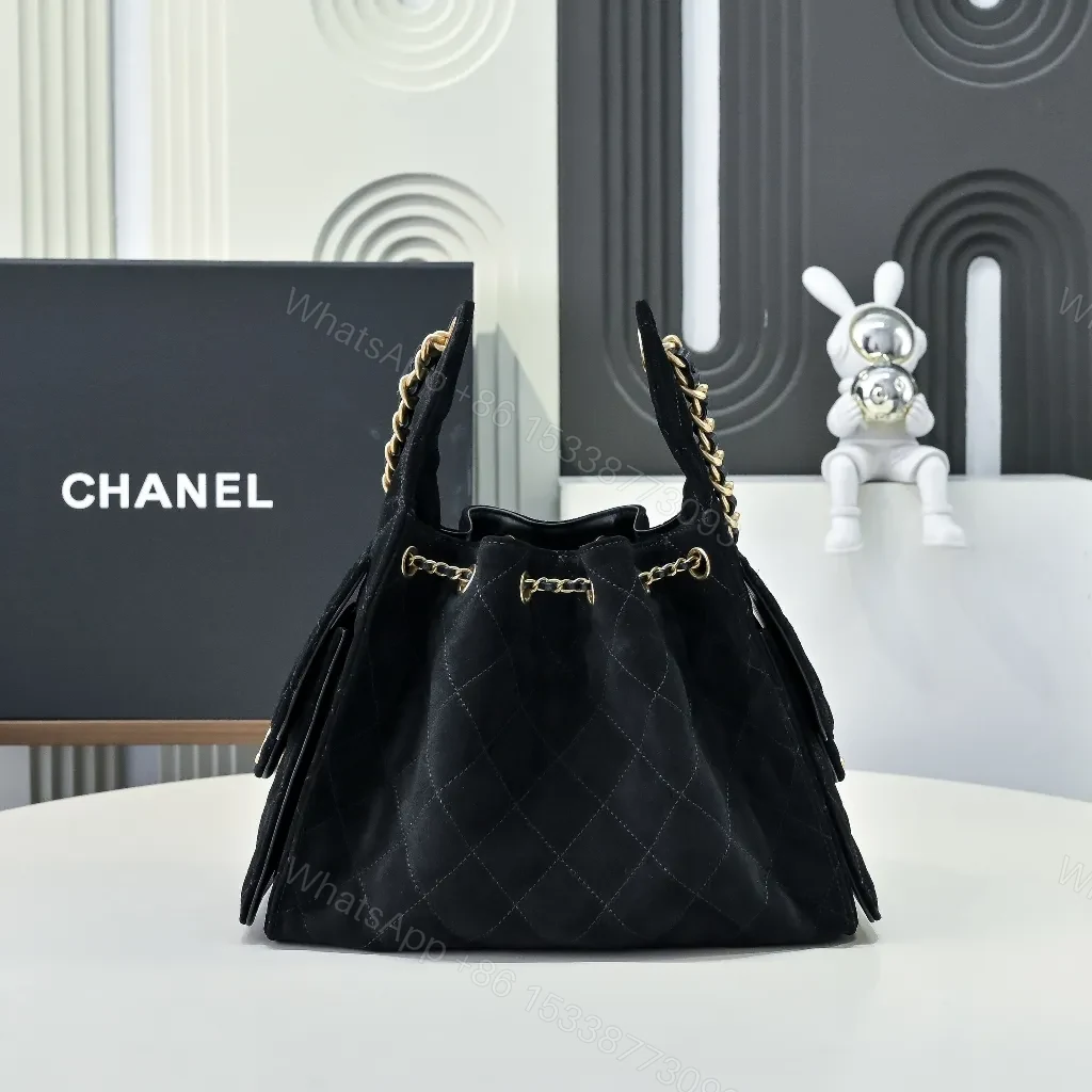View 8 of Quilted Black Shoulder Bag: Gold Chain, Luxe Texture, Versatile Style