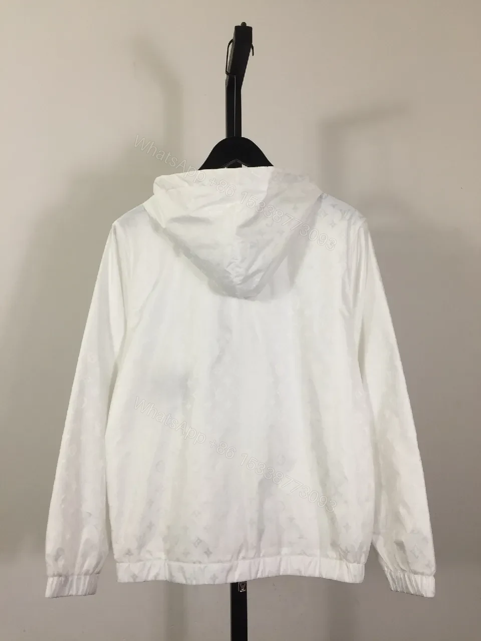 View 5 of White Zip-Front Jacket with Subtle Monogram Texture