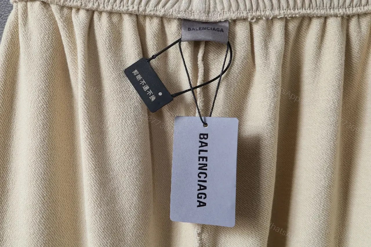 View 4 of Beige Wide-Leg Pants with Drawstring and Embroidered Patches