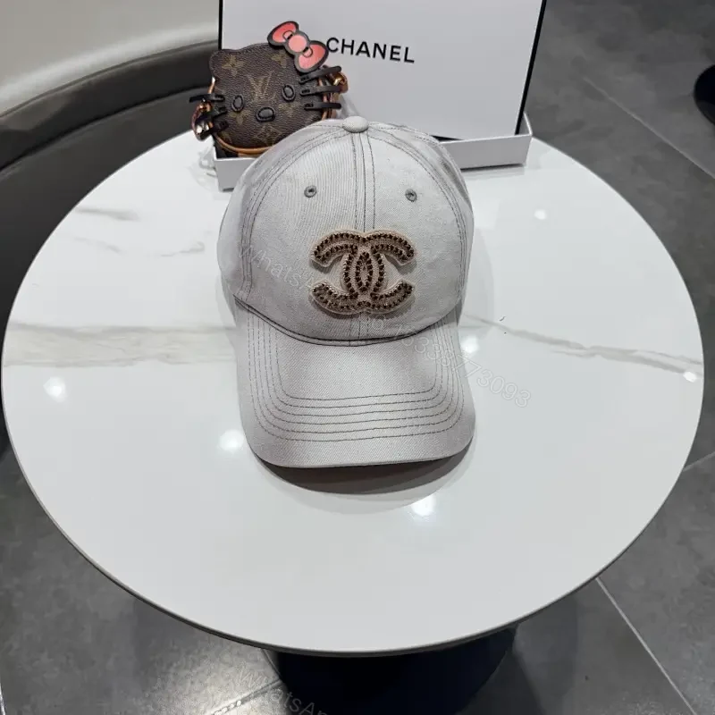 Casual Luxe Cap: Subtle Denim, Interlock Emblem, Adjustable Strap — view 1